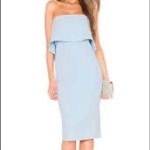 Likely light blue midi dress
